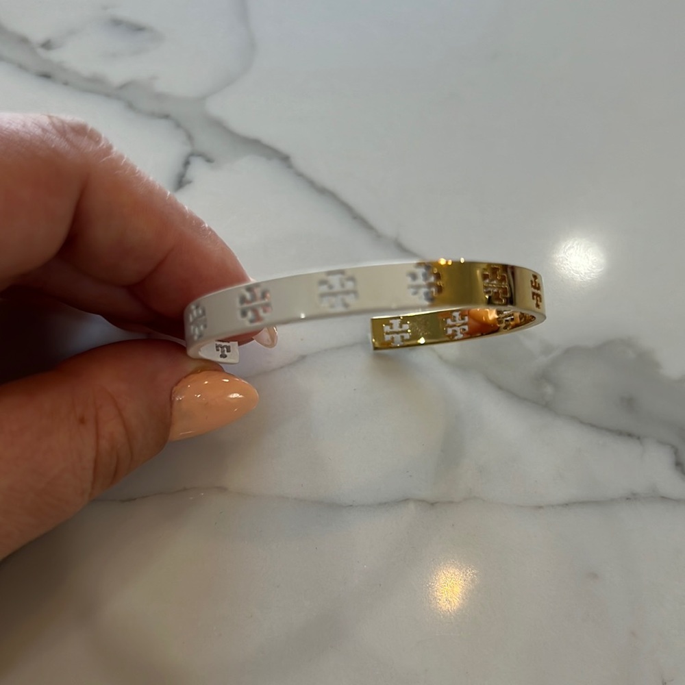 Tory Burch white and gold bangle bracelet